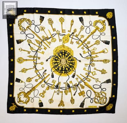 HERMÈS Paris 
Carré en twill de soie titré...