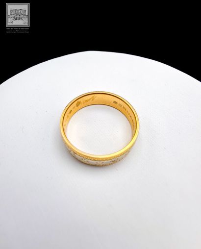 Alliance 
Or jaune et gris 18K 750/°°°
Poinçon...