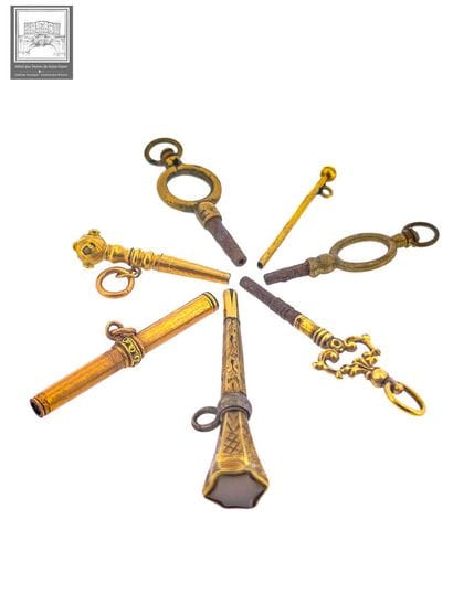 Lot de 4 clés de montre en or jaune et rose...