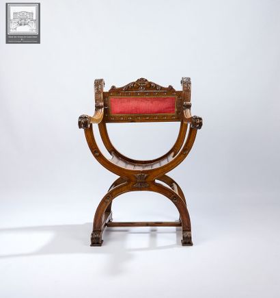 Fauteuil curule ou Dagobert 
Bois sculpté...