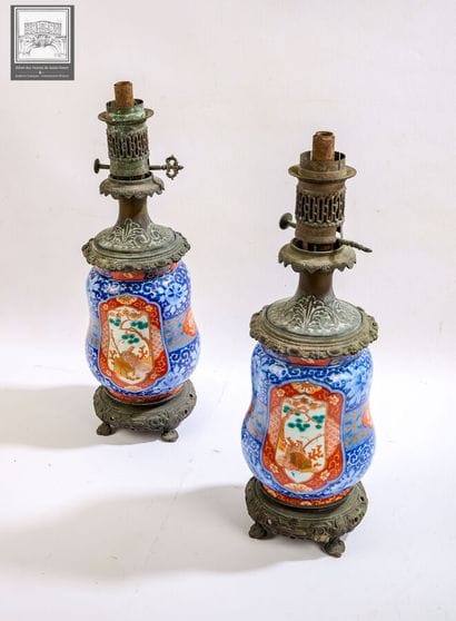 Paire de lampes à pétrole
Bronze et Corp...