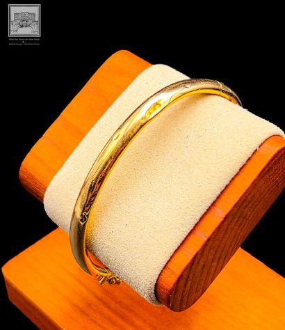 Bracelet rigide
Or jaune 18K 750/°°° et platine...