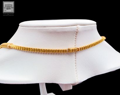 Collier à maille serpent en or jaune 18K...