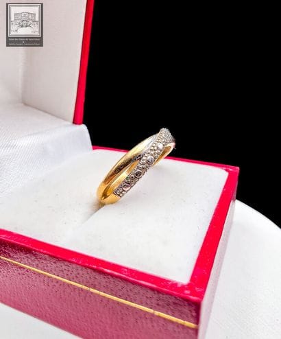 Bague
Or jaune et gris 18K 750/°°°
TDD :...