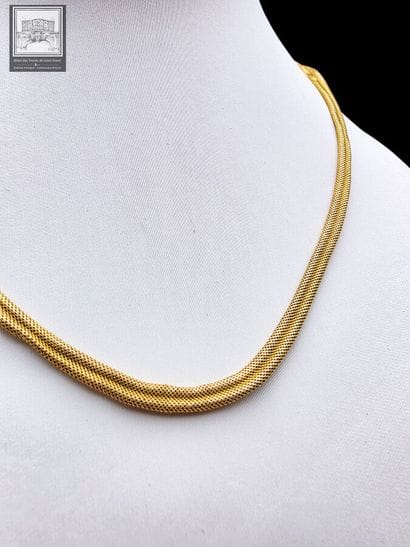 Collier maille chevron en or jaune 18K 750/°°°
Poinçon...
