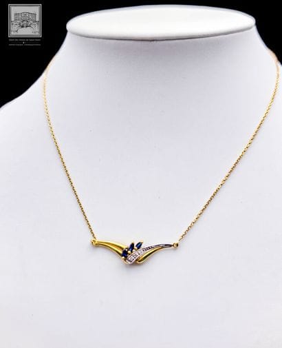 Collier
or jaune et gris 750/°°°
Poinçon...