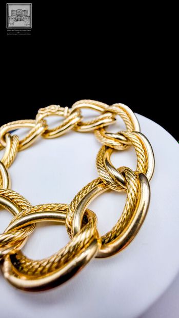 Bracelet articulé en or jaune 18 K 750/°°°,...