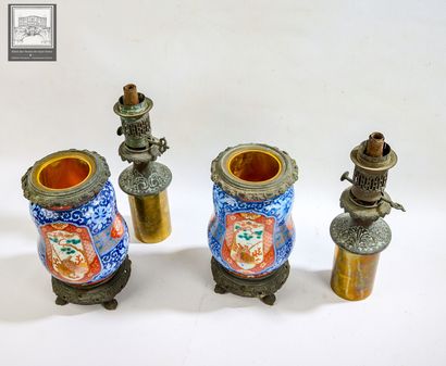 Paire de lampes à pétrole
Bronze et Corp...