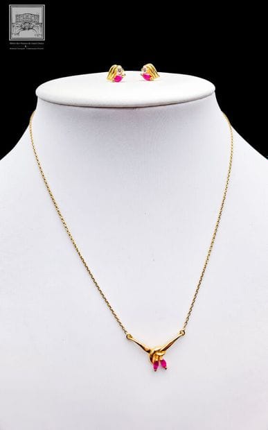Demi parure 
or jaune 750/°°°
Collier pendentif...