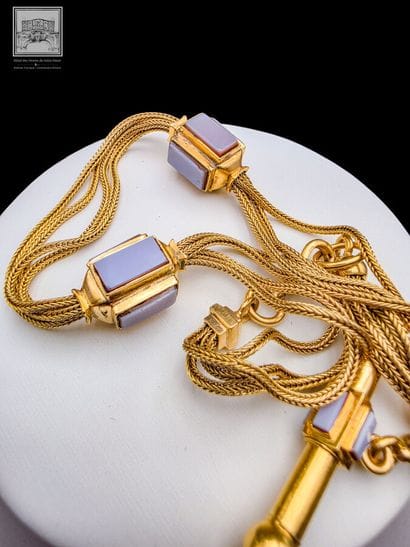Chaîne de montre en or jaune 18K 750/°°°
Poinçon...