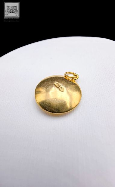 Pendentif oeil
or jaune18K 750/°°° et verre
Poinçon...