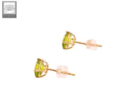 Paire de boutons d'oreilles en or jaune 750°/.(18K)...