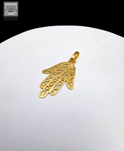 Pendentif en or jaune 18K 750/°°° représentant...