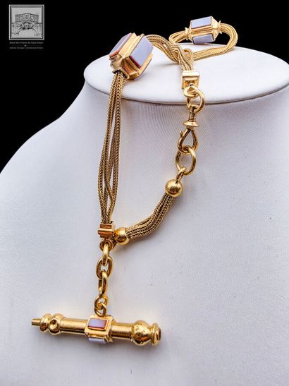 Chaîne de montre en or jaune 18K 750/°°°
Poinçon...