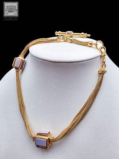 Chaîne de montre en or jaune 18K 750/°°°
Poinçon...