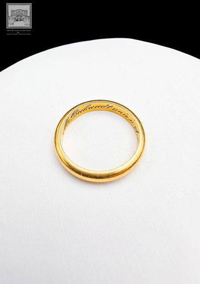 Alliance 
en or jaune 18K 750/°°° 
poinçon...