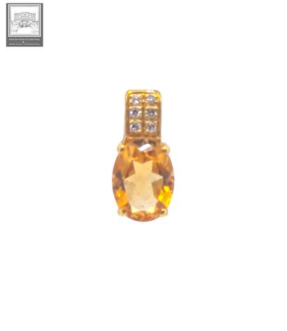 A 750°/ (18K) yellow gold pendant weighing...