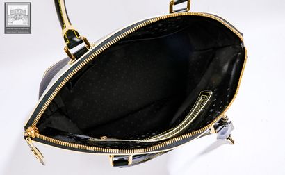 LOUIS VUITTON.
SAC à main modèle Lockit 
Cuir...