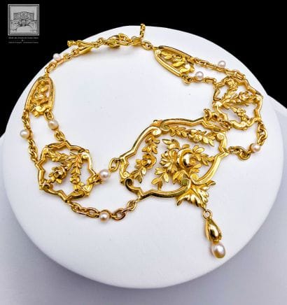 Draped necklace 
750/°°° openwork yellow...