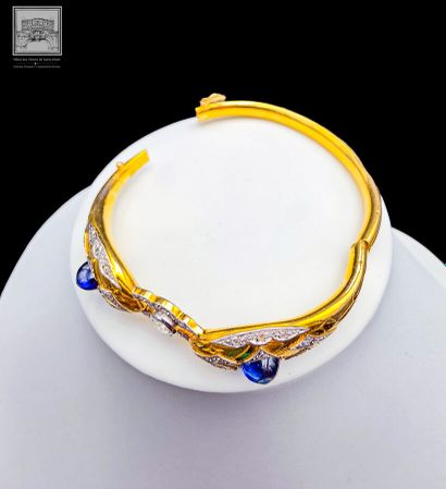 Bracelet rigide
Or jaune 18K 750/°°° et platine...