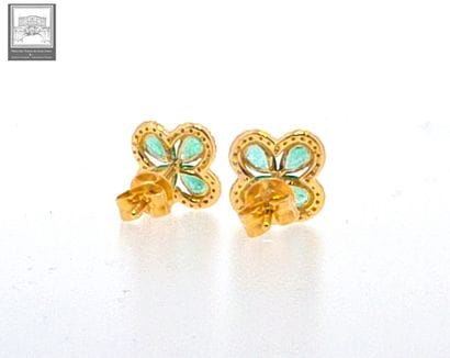 Pair of ear studs in 750°/.(18K) 1g65 yellow...