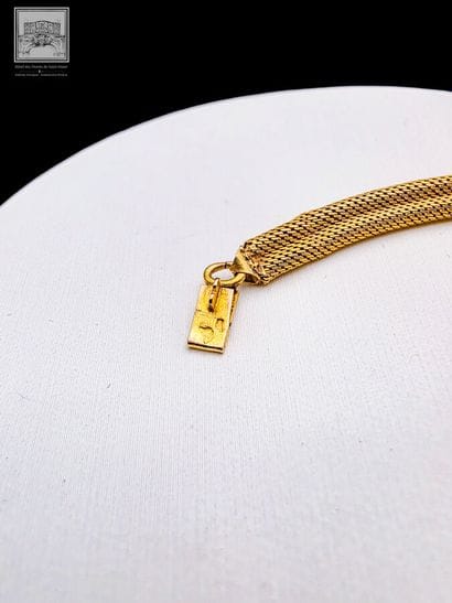 Collier maille chevron en or jaune 18K 750/°°°
Poinçon...