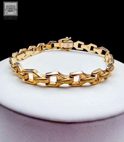 Bracelet
Or jaune 14K 585/°°°
Poids : 10.26...