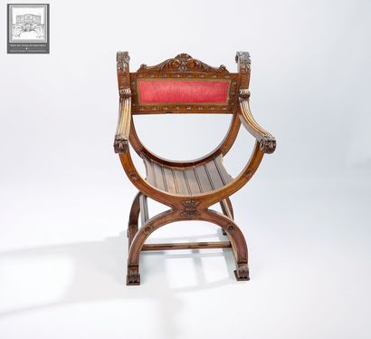 Fauteuil curule ou Dagobert 
Bois sculpté...