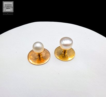 Paire de boutons de col
Or jaune 18K 750/°°°...