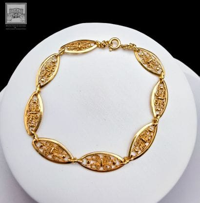 Small bracelet with openwork olive-shaped...