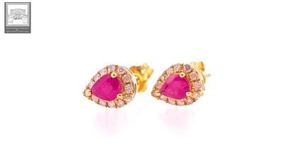 Pair of pear-shaped ear studs in 750°/.(18K)...