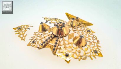 Ancienne broche en or 18K 750/°°°
Traces...