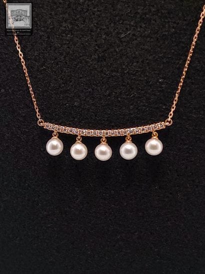 Collier en or rose 750°/.(18K) 3g10 serti...
