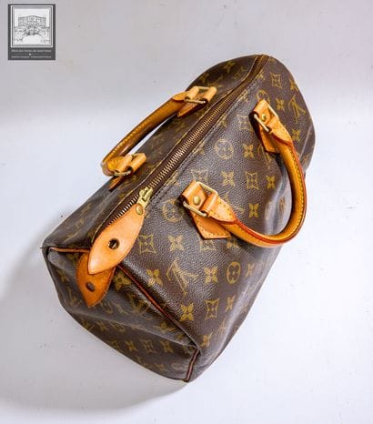 LOUIS VUITTON,
Sac modéle Speedy 30 en cuir...