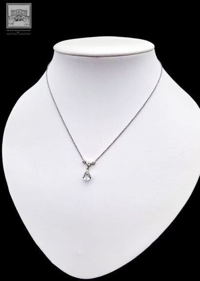 Necklace + Pendant
750/°°° white gold, eagle-head...