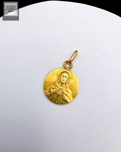 Lot de 2 pendentifs
Or jaune 18K 
Poids brut...