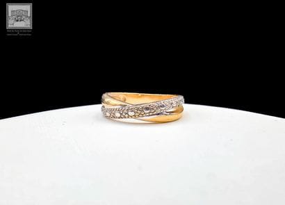 Bague
Or jaune et gris 18K 750/°°°
TDD :...