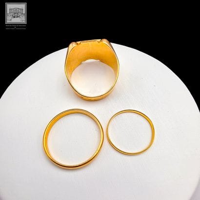 Signet ring (TDD 62) and two wedding bands...