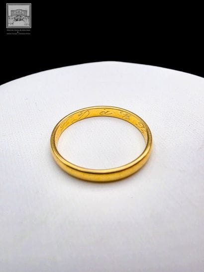 Alliance en or jaune 18K 750/°°°
Inscription...