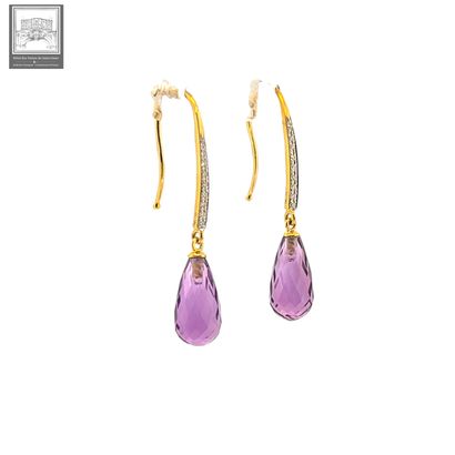 A beautiful pair of 750°/ (18K) yellow gold...