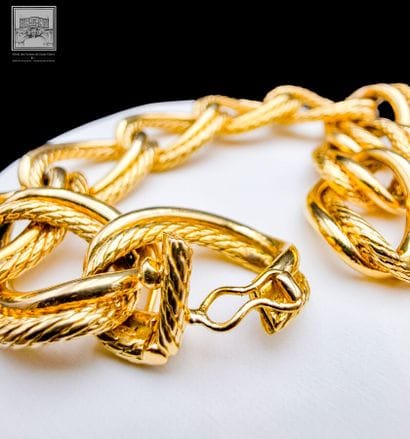 Bracelet articulé en or jaune 18 K 750/°°°,...