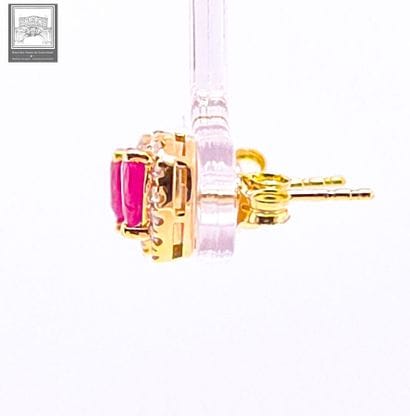 Pair of pear-shaped ear studs in 750°/.(18K)...
