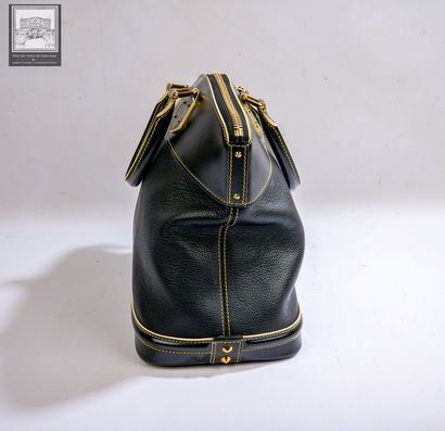 LOUIS VUITTON.
SAC à main modèle Lockit 
Cuir...