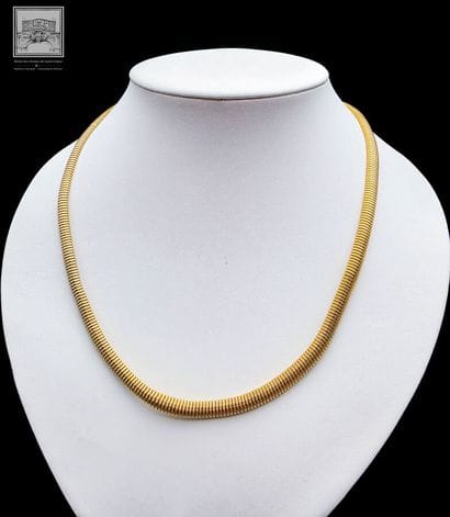 Collier à maille serpent en or jaune 18K...