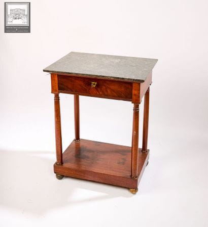 Console en acajou 
Epoque Empire 
Ouvrant...