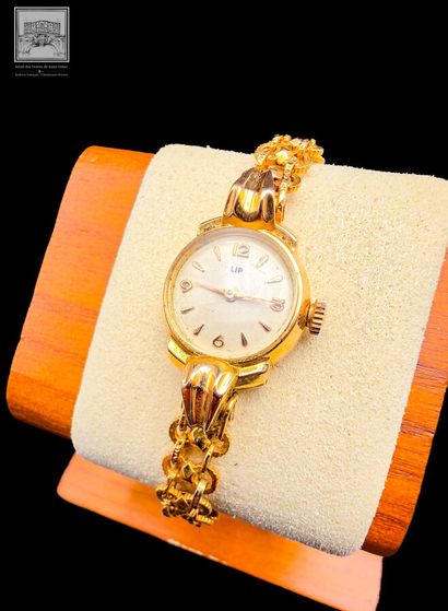 LIP 
Montre boitier et bracelet en or 18K...