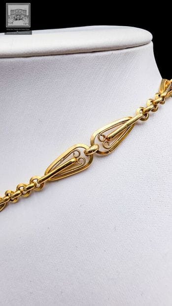Chaîne de montre 
Or Jaune 18K 750/°°°
Poinçon...