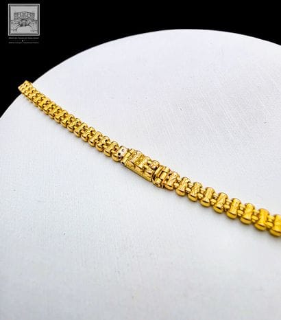 Collier à maille serpent en or jaune 18K...