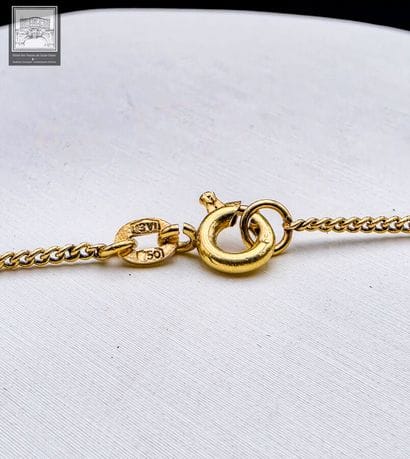 Collier + pendentif en or jaune 18K 750/°°°...
