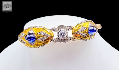 Bracelet rigide
Or jaune 18K 750/°°° et platine...